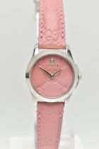 A 'GUCCI G TIMELESS' WRISTWATCH, quartz movement, round pink leather dial with embossed Gucci