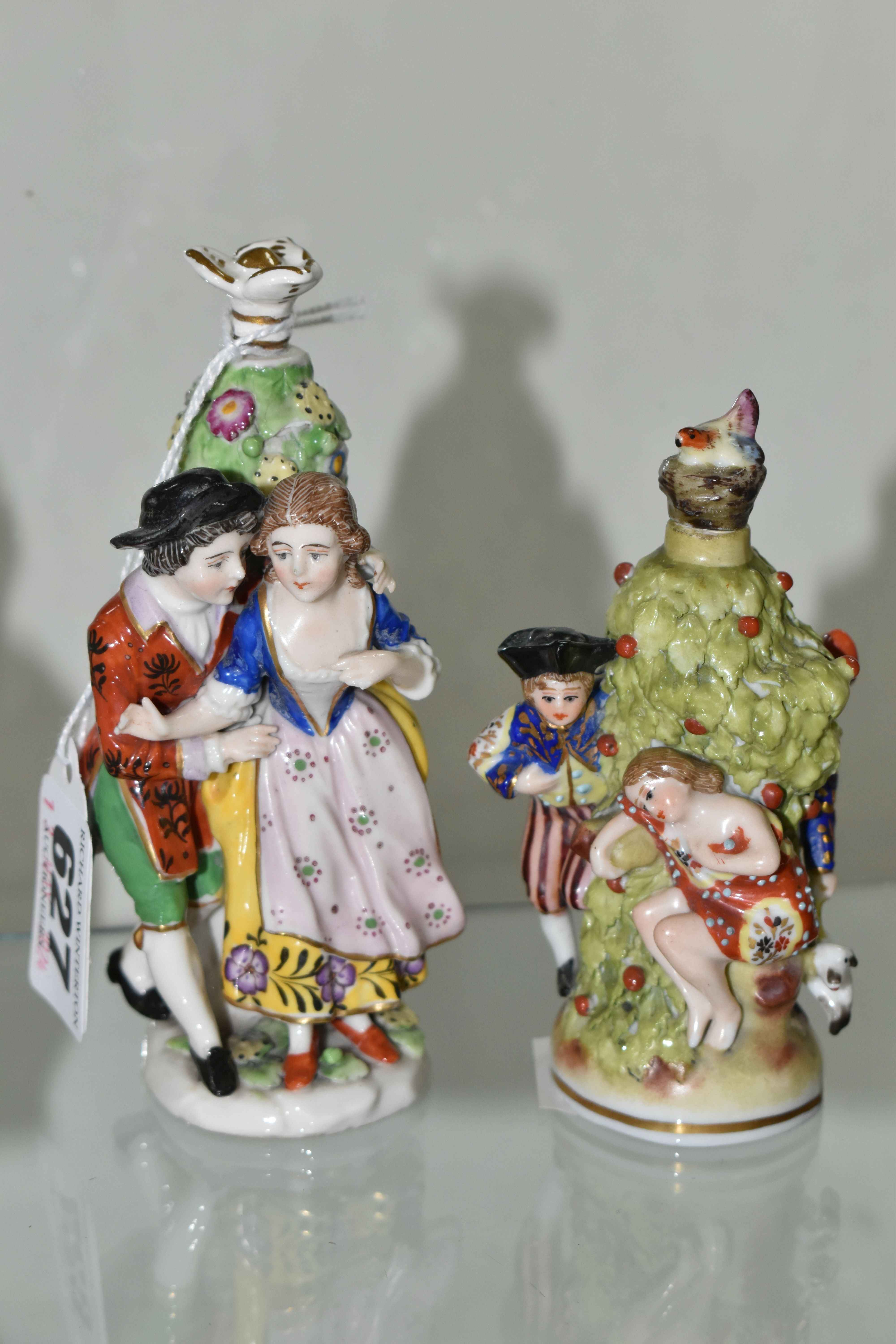 FIVE LATE 19TH AND 20TH CENTURY CONTINENTAL PORCELAIN SCENT BOTTLES, three of figural form with - Image 4 of 5