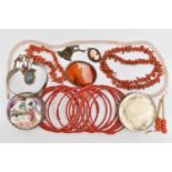 A COLLECTION OF WHITE METAL CORAL, GLASS BEAD AND GEM-SET JEWELLERY, to include an expandable red