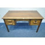 A 20TH CENTURY OAK DESK, fitted with three drawers, width 138cm x depth 77cm x height 77cm, along