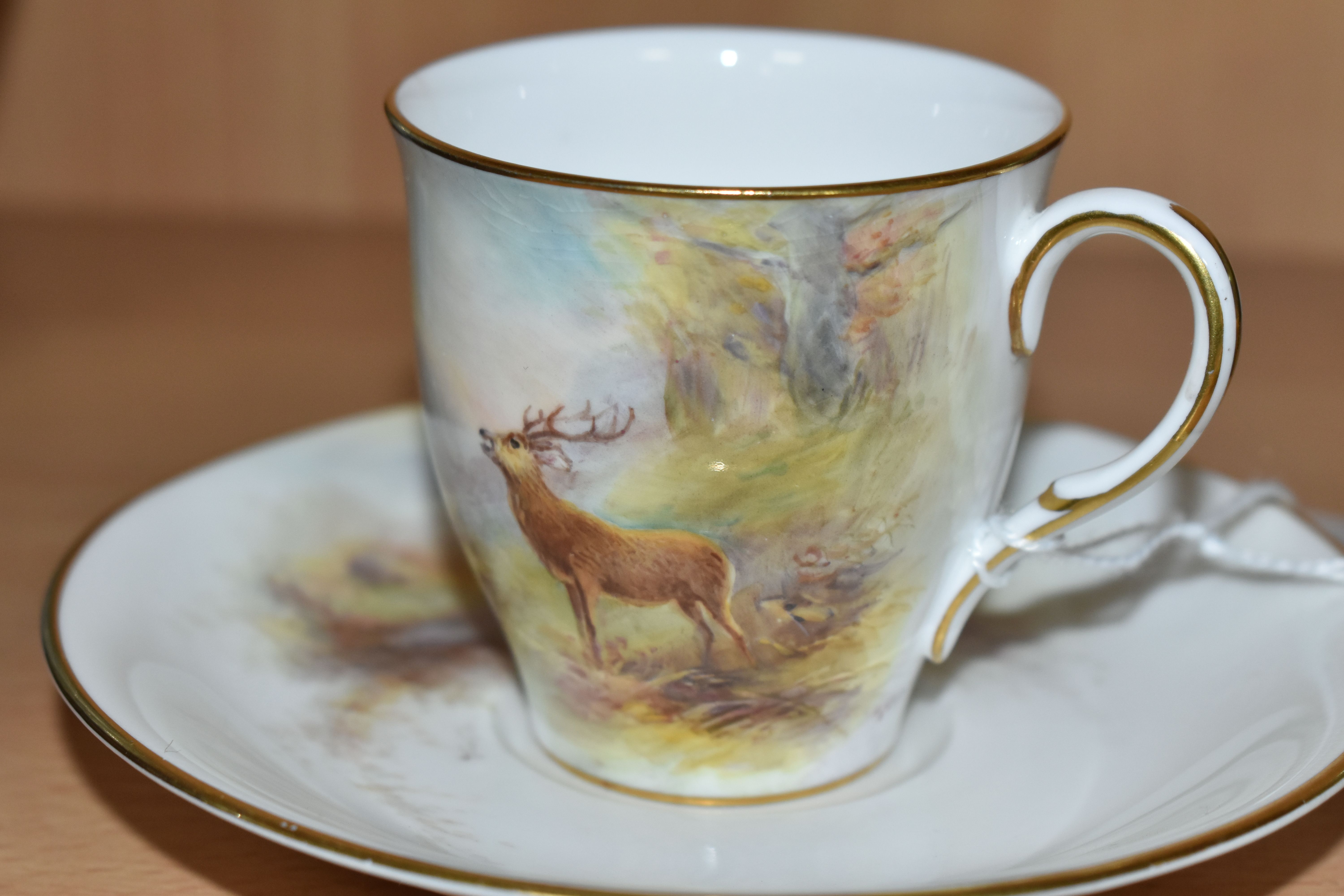 A ROYAL WORCESTER 'MAPLE' CABINET CUP AND SAUCER BY HARRY STINTON, painted with stags in a - Image 5 of 5