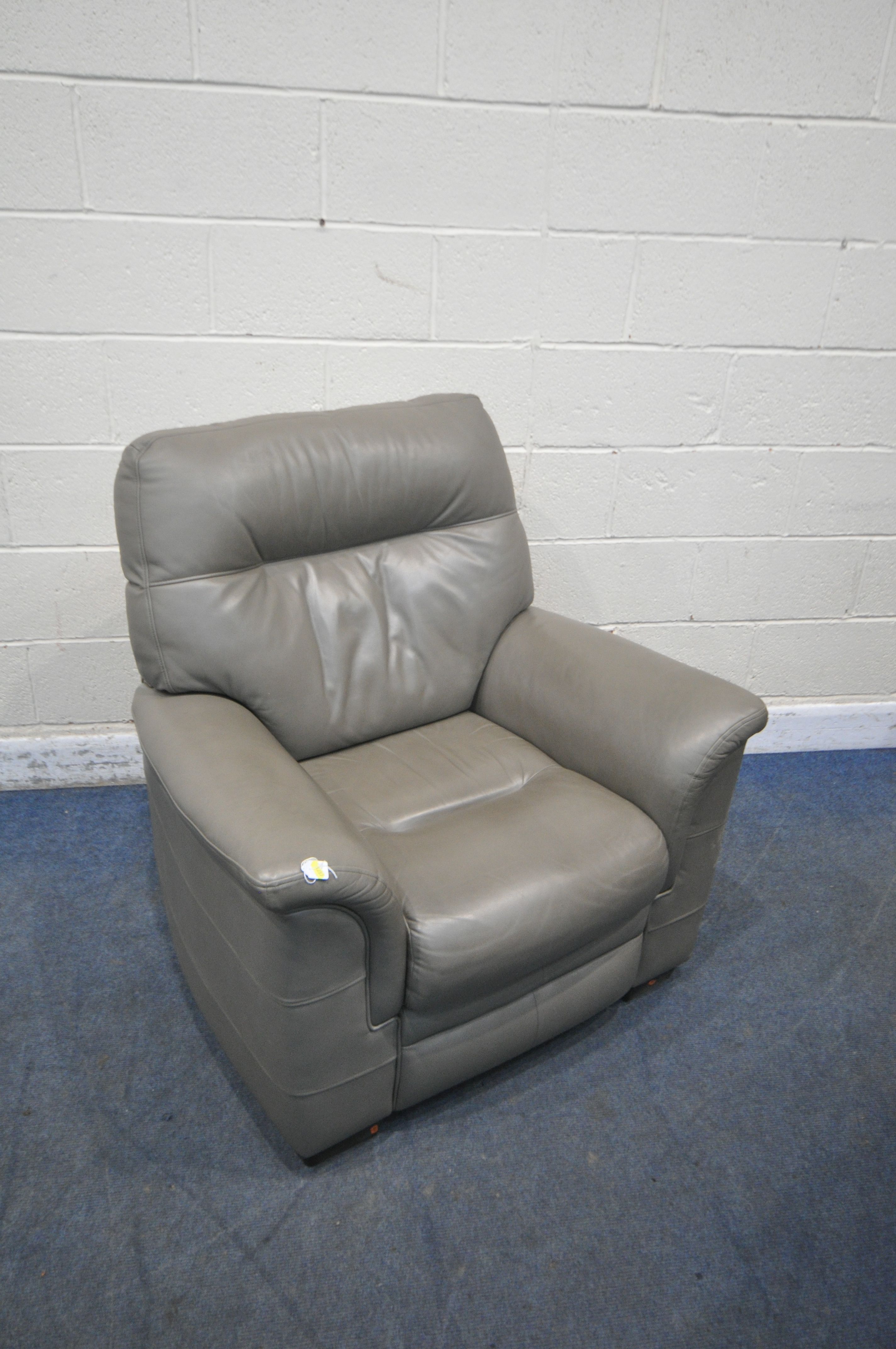 A WIDE BROWN LEATHER ARMCHAIR, width 137cm x depth 100cm, and a Parker Knoll grey leather - Image 4 of 4