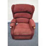 A HSL RED UPHOLSTERED RISE AND RECLINE ARMCHAIR, along with a red armchair (condition report: PAT