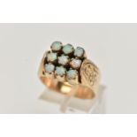 A 9CT GOLD OPAL RING, large square shape ring, set with nine circular cut opal cabochons, each in