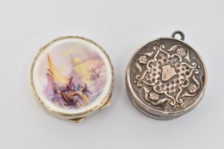 AN EARLY 20TH CENTURY SILVER MINIATURE COMPACT AND PILL BOX, both of circular outline, the miniature
