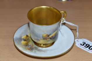 A ROYAL WORCESTER PORCELAIN CABINET CUP AND SAUCER, hand painted depicting Moorland sheep by James