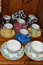A GROUP OF COFFEE CUPS AND TWO ROYAL WORCESTER 'PRIMULA' TEA CUPS AND SAUCERS, comprising a set of