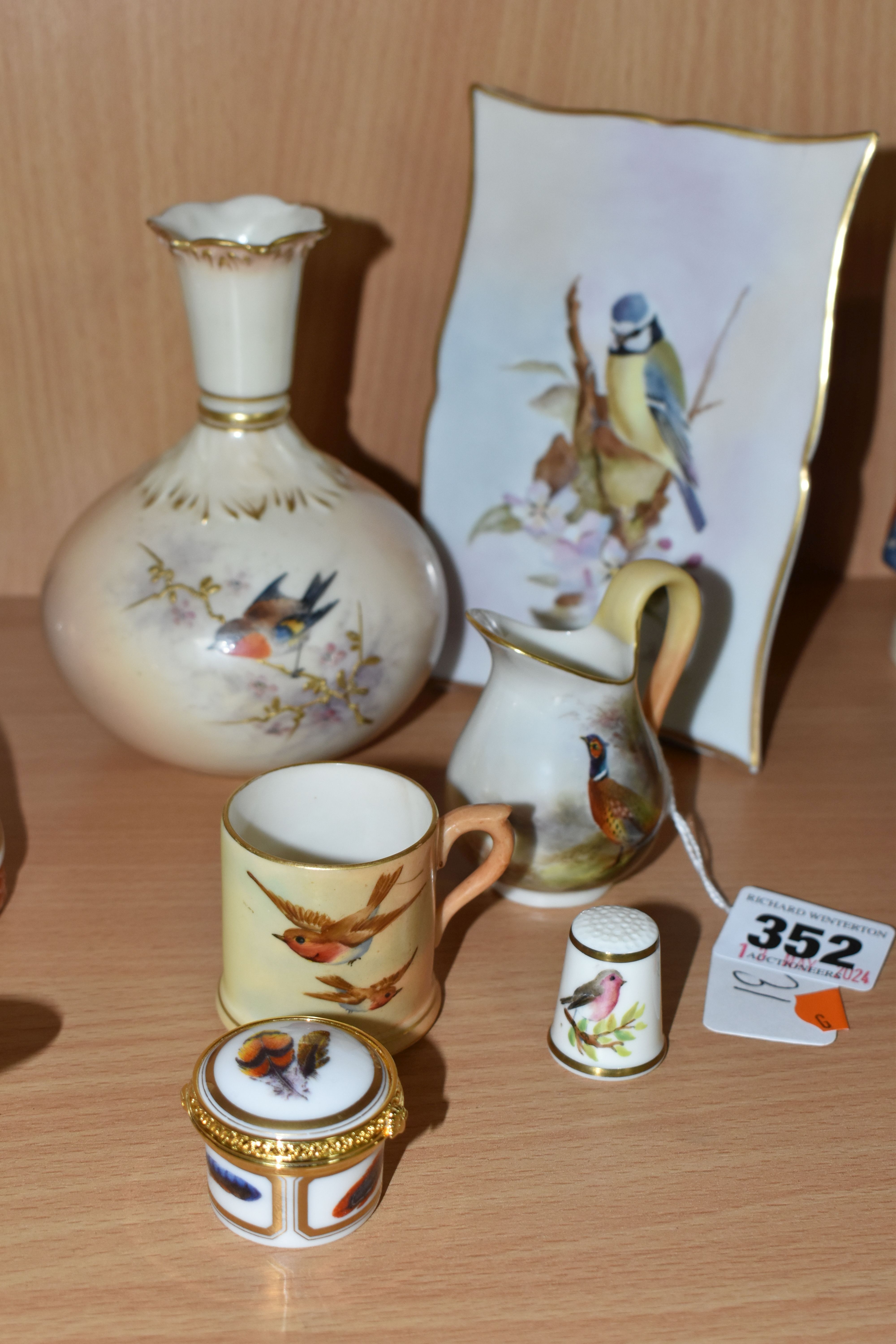 A SMALL GROUP OF WORCESTER PORCELAIN, comprising a small Royal Worcester jug painted with a