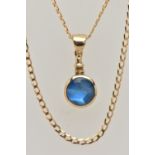 A 9CT GOLD GEM SET PENDANT AND CHAIN, the circular pendant set with a blue sheen cabochon,