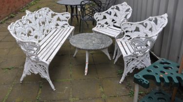 A LATE 20TH CENTURY CAST ALUMINIUM GARDEN SET comprising of a three seat bench and two matching