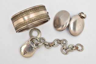 THREE ITEMS OF WHITE METAL JEWELLERY, to include a wide hinged bangle, fitted with a push button
