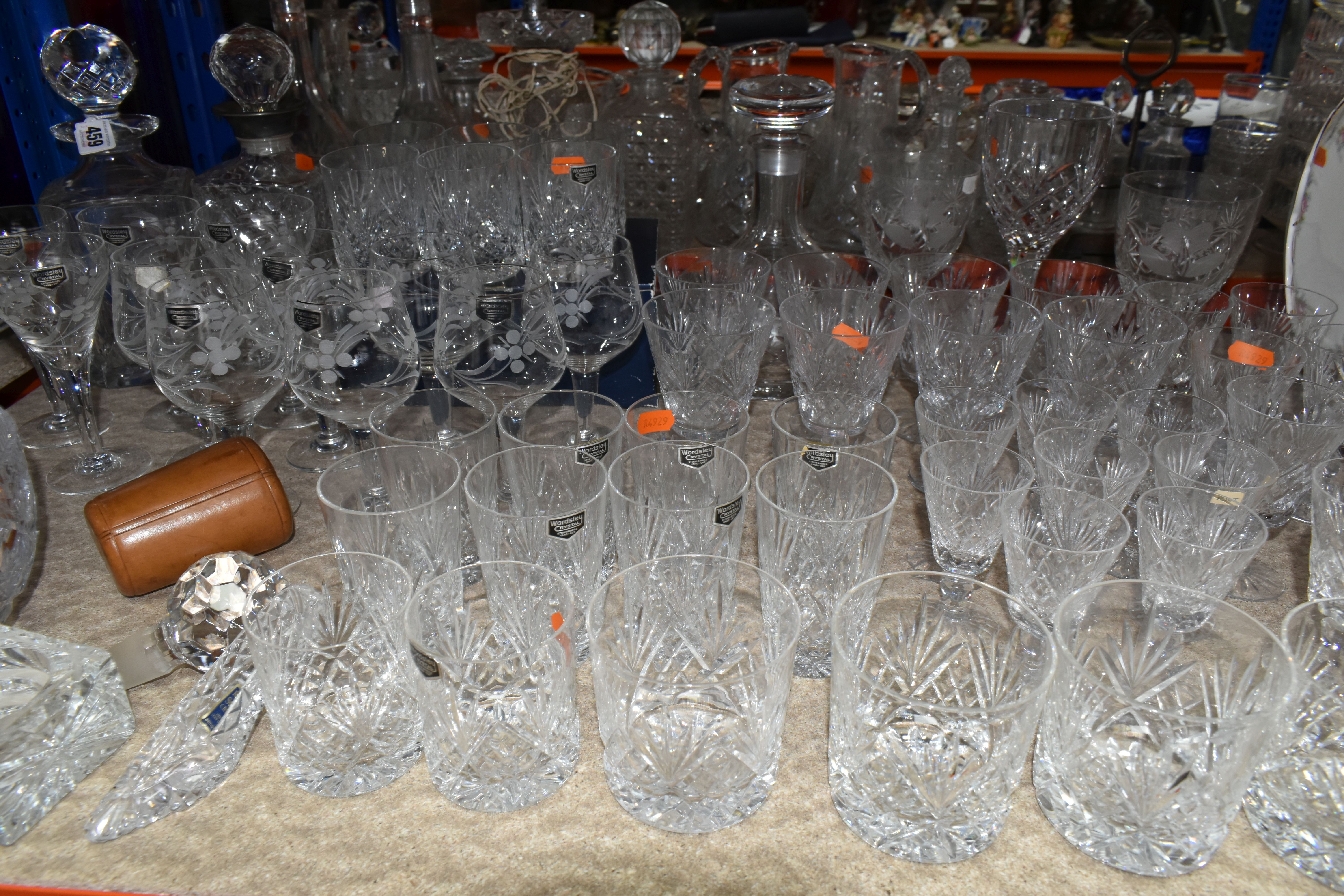 A LARGE COLLECTION OF WORDSLEY AND ROYAL DOULTON CRYSTAL CUT GLASSWARE ETC, including whisky