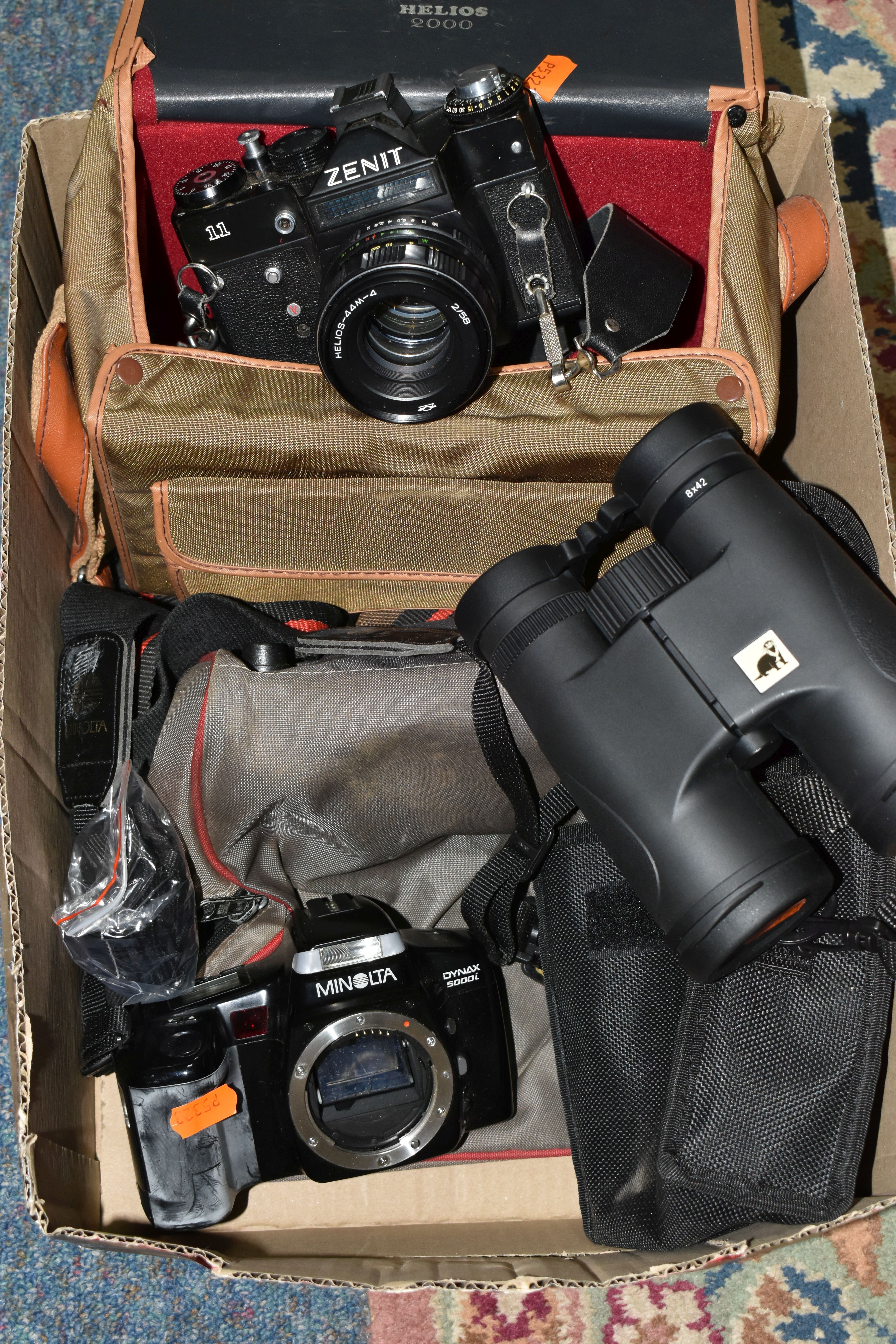 CAMERAS AND BINOCULARS ETC, comprising a Minolta Dynax 5000i SLR camera body, Zenit 11 35mm film SLR