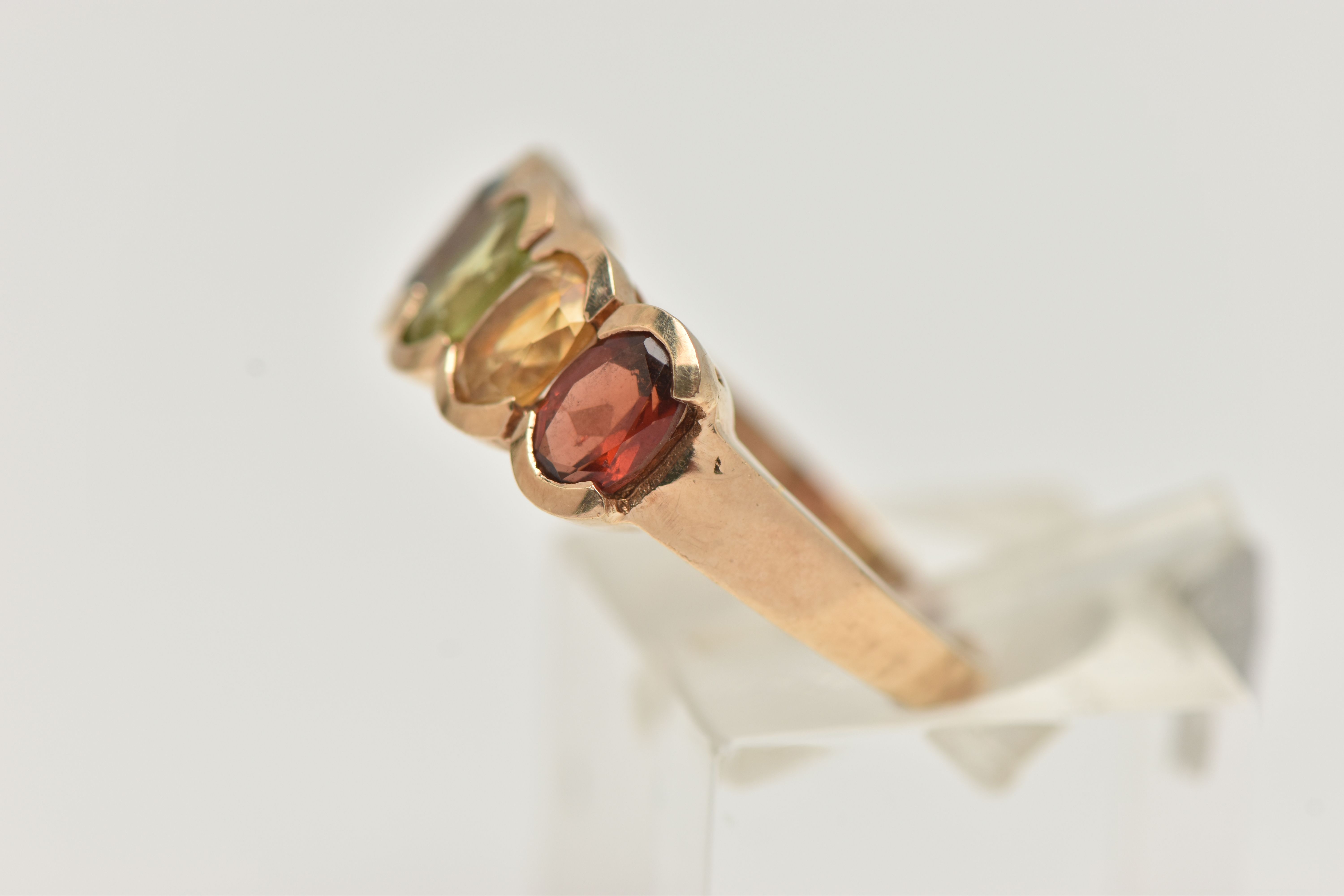 A 9CT GOLD MULTI GEM SET RING, designed as a row of five oval cut stones to include garnet, citrine, - Image 2 of 4