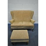 A PARKER KNOLL WING BACK TWO SEATER SOFA, width 136cm x depth 87cm x height 98cm, along with a