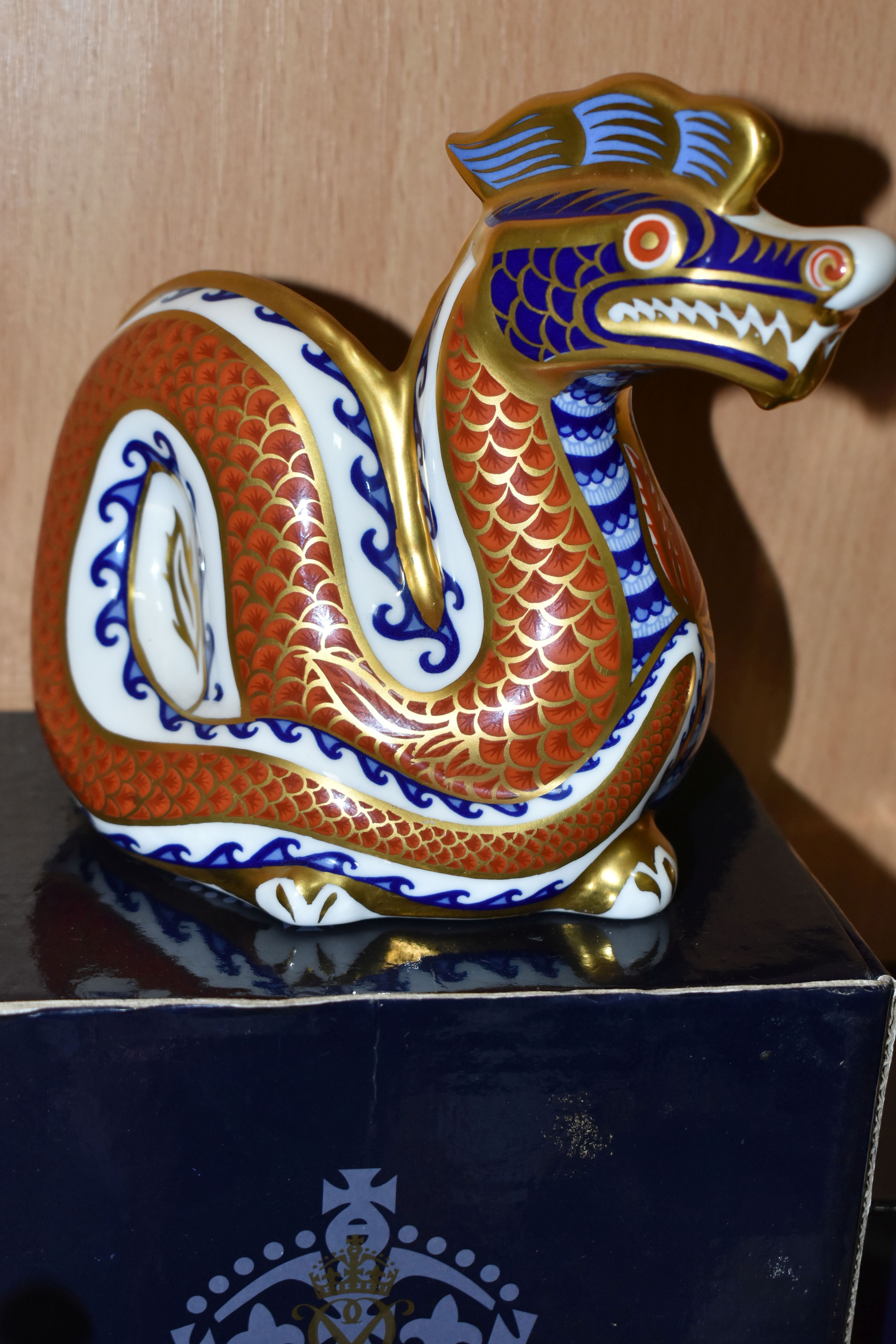 TWO BOXED ROYAL CROWN DERBY PAPERWEIGHTS, comprising Imari Snake, gold stopper, and a Dragon, silver - Image 3 of 4
