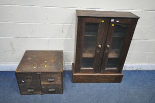A STAINED PINE CABINET, with double glazed doors, width 79cm x depth 31cm x height 107cm, along with