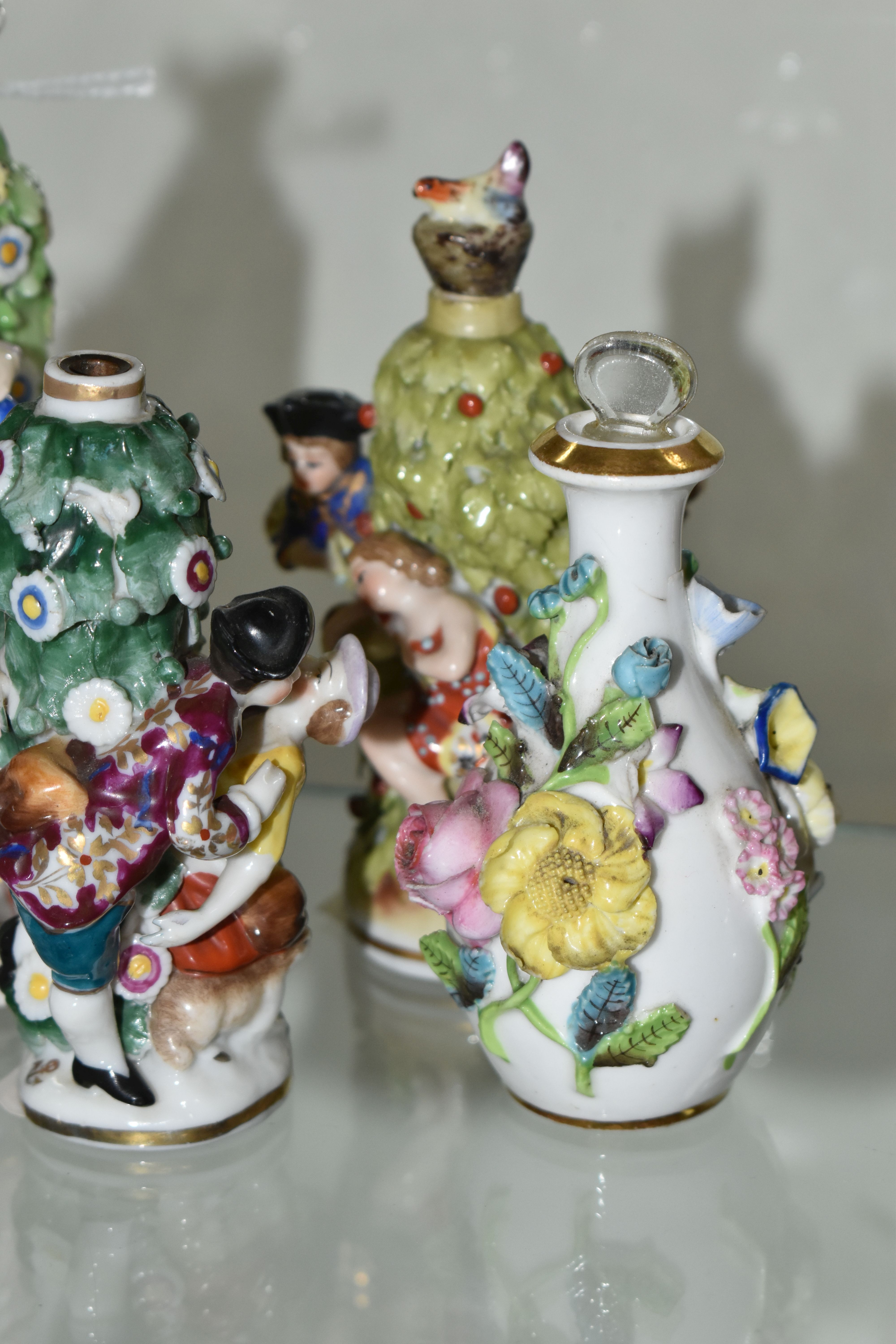 FIVE LATE 19TH AND 20TH CENTURY CONTINENTAL PORCELAIN SCENT BOTTLES, three of figural form with - Image 3 of 5