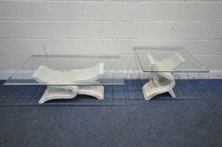 A STONE EFFECT COFFEE TABLE, with a rectangular bevelled glass top, length 120cm x depth 70cm x