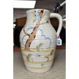 A CLARICE CLIFF SINGLE HANDLED LOTUS JUG, in Tiger Tree pattern, painted with a stylised tree on a