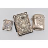 THREE EARLY 20TH CENTURY SILVER ACCESSORIES, to include an Edwardian embossed silver fronted