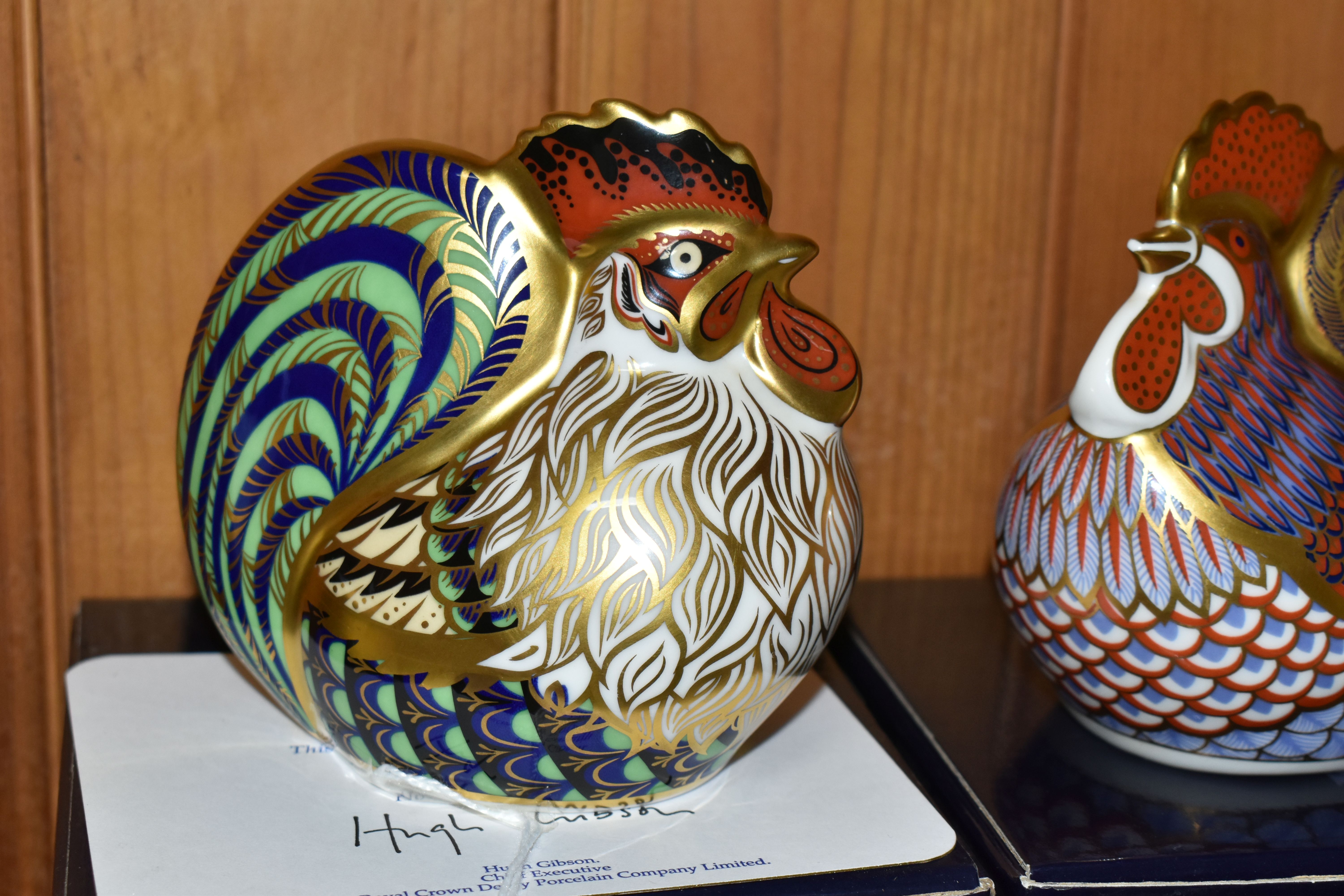 A ROYAL CROWN DERBY IMARI PAPERWEIGHT FRIESIAN COW 'BUTTERCUP' AND TWO BOXED 'FARMYARD COCKERELS', - Image 3 of 6