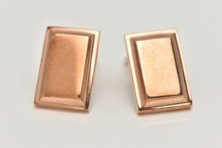 A PAIR OF ROSE METAL CLIP ON EARRINGS, each of a polished rectangular form, measuring