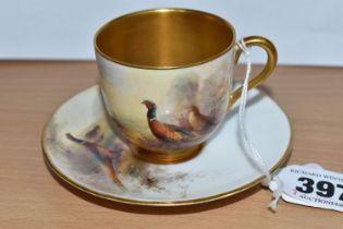 A ROYAL WORCESTER CABINET CUP AND SAUCER, signed by James Stinton, date cypher 1912, decorated