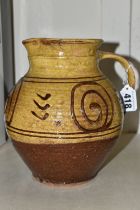 MICHAEL CARDEW (1901-1983) FOR WINCHCOMBE POTTERY, a slip decorated jug with impressed Cardew and