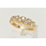 AN 18CT GOLD DIAMOND RING, half eternity style set with a double row of round brilliant cut