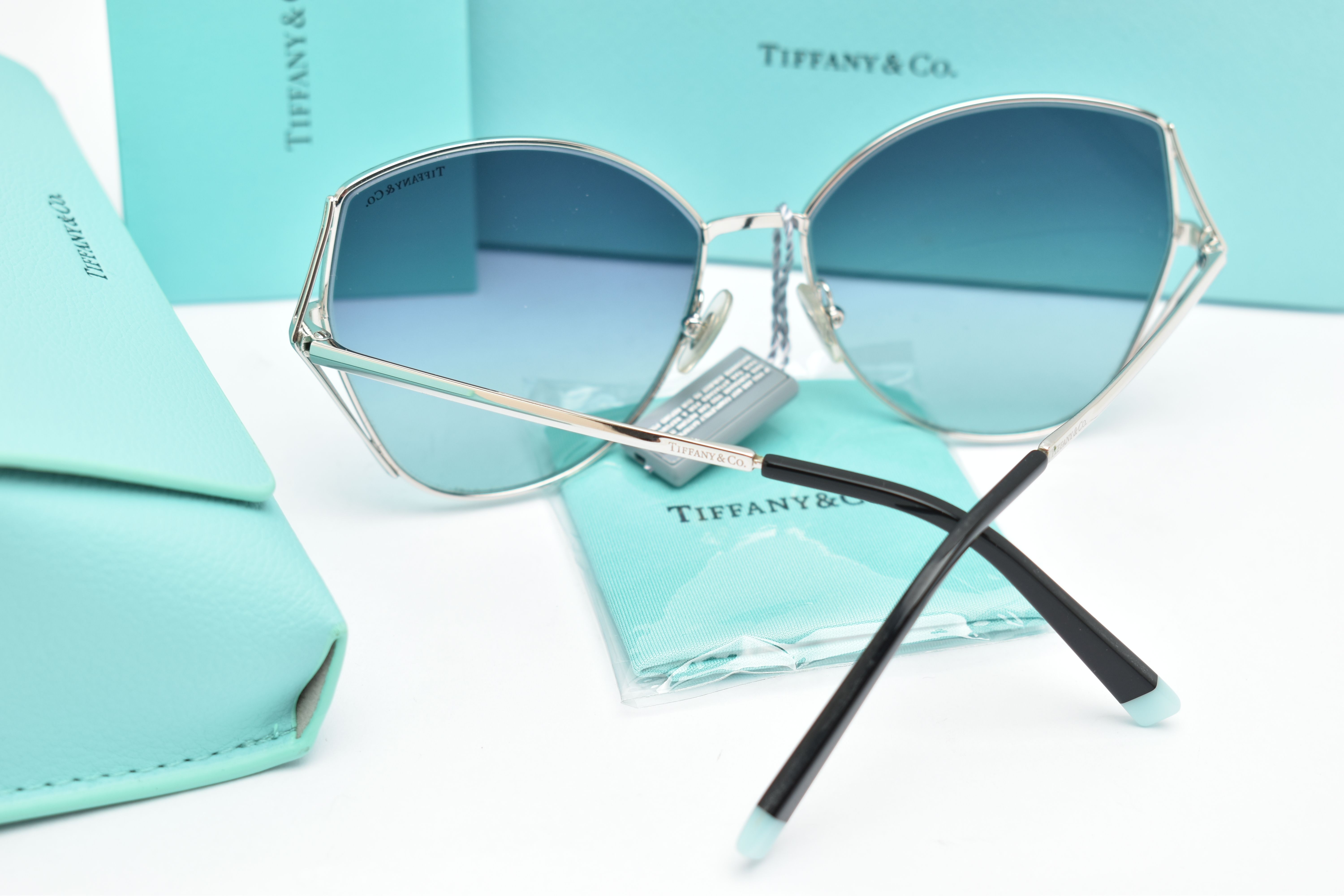 A PAIR OF 'TIFFANY & CO' SUNGLASSES, a pair of butterfly style TF3072 sunglasses, together with - Image 2 of 4