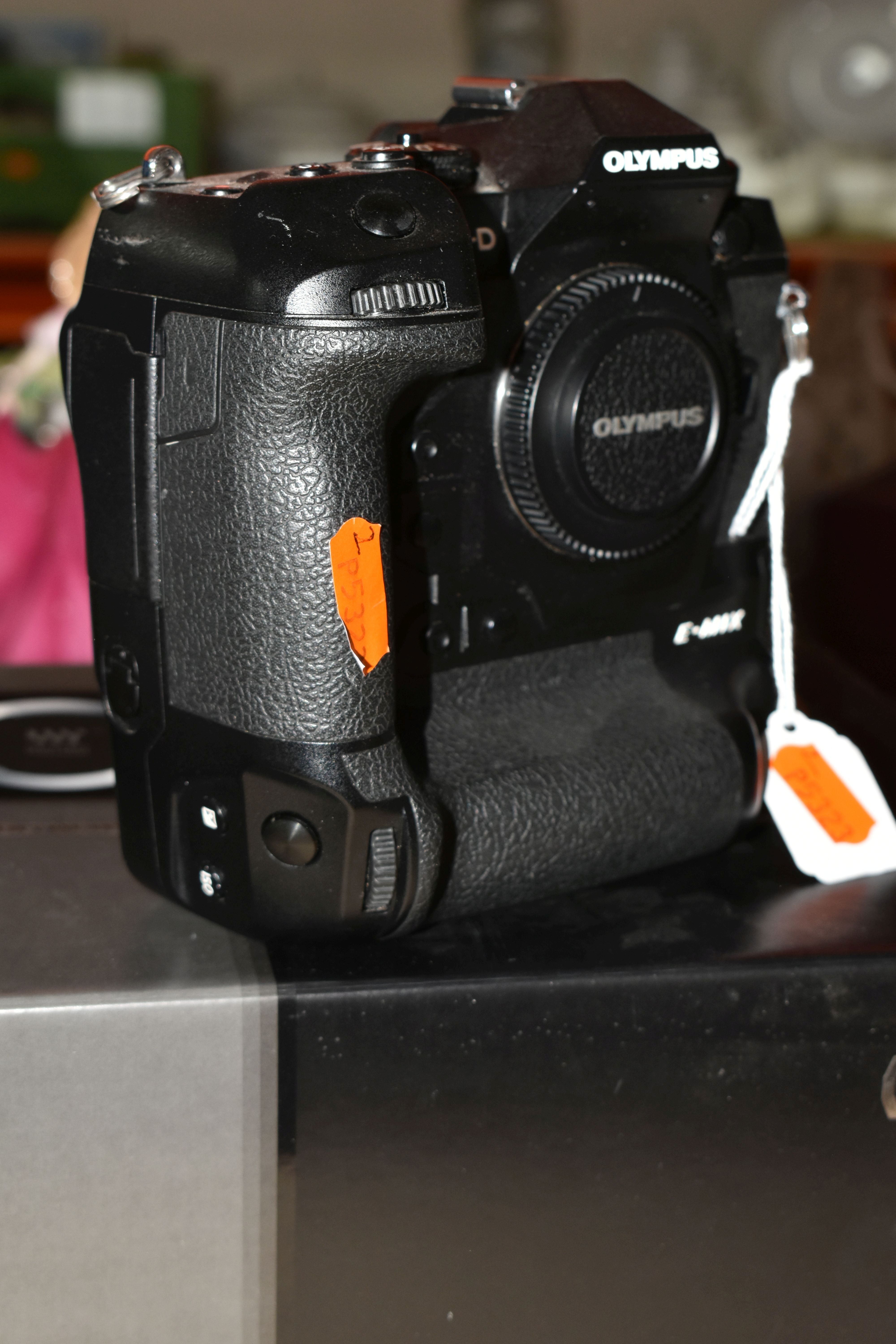 AN OLYMPUS OM-D E-M1X MIRRORLESS 4/3 CAMERA BODY, complete with battery charger (no UK power cable), - Image 4 of 4