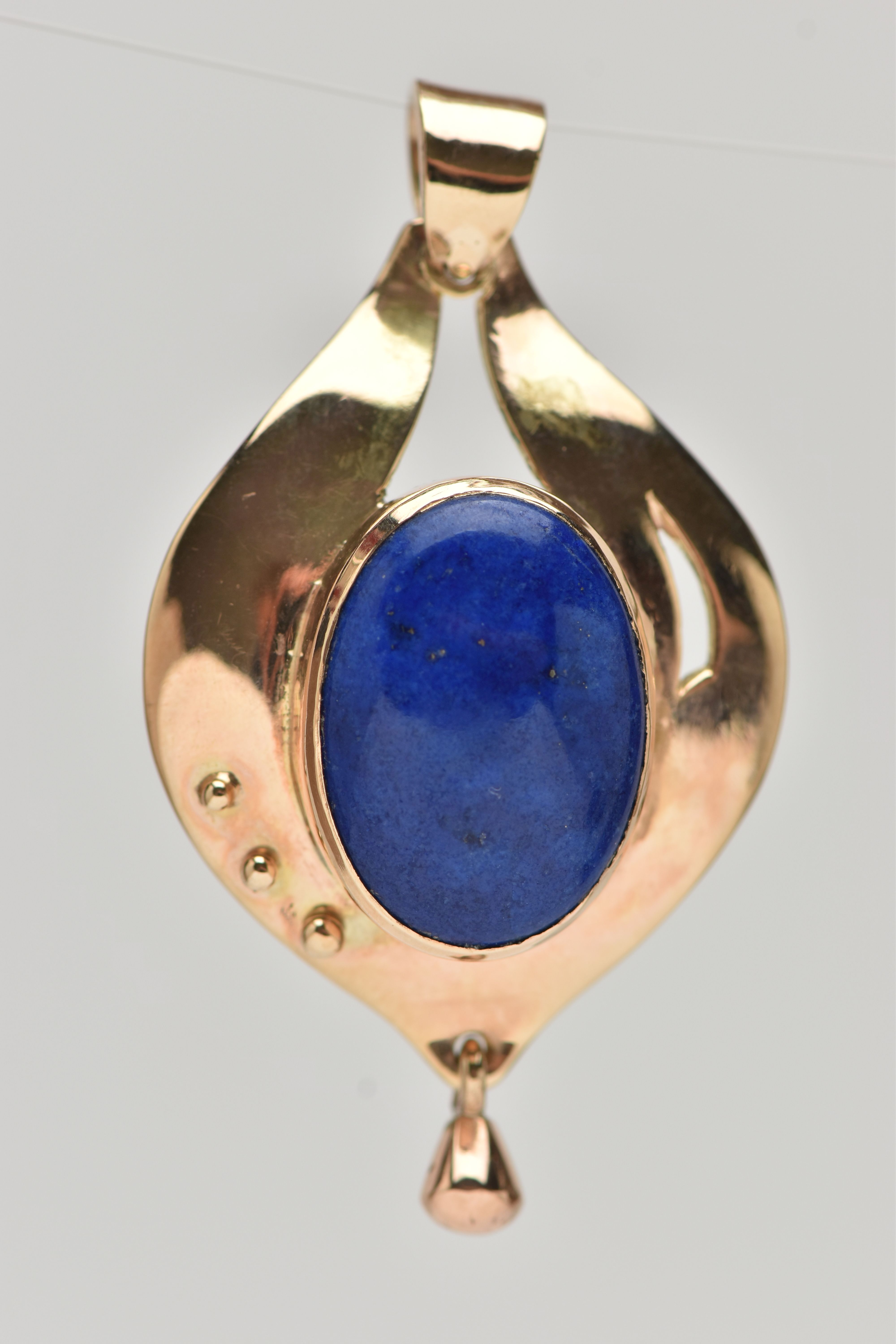 A 9CT GOLD LAPIS LAZULI PENDANT, tear drop shape pendant, set with a central oval lapis lazuli