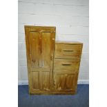 A 20TH CENTURY STAINED PINE GENTLEMAN'S WARDROBE, with a single large door, a single small door