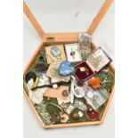 A BOX OF ASSORTED ITEMS, a hexagonal wooden and glass lidded display box with green fabric interior,