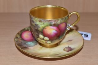A ROYAL WORCESTER SMALL CUP AND SAUCER, W Powell for Royal Worcester, a fallen fruit painted