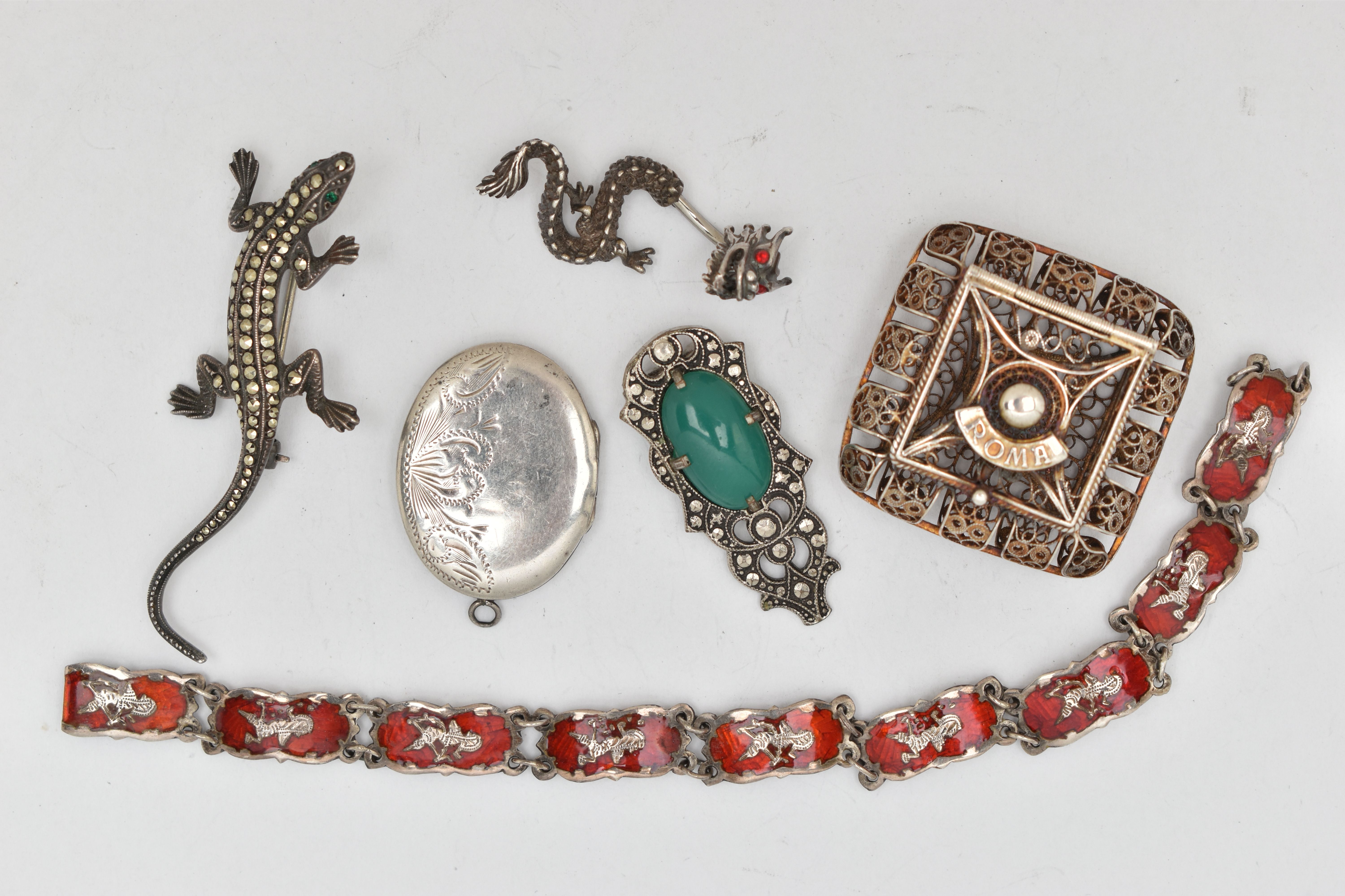 SIX ITEMS OF JEWELLERY, to include a silver oval locket, hallmarked Birmingham, approximate gross