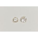 TWO LOOSE DIAMONDS, the first a round brilliant cut diamond, approximate diamond weight 0.23ct,