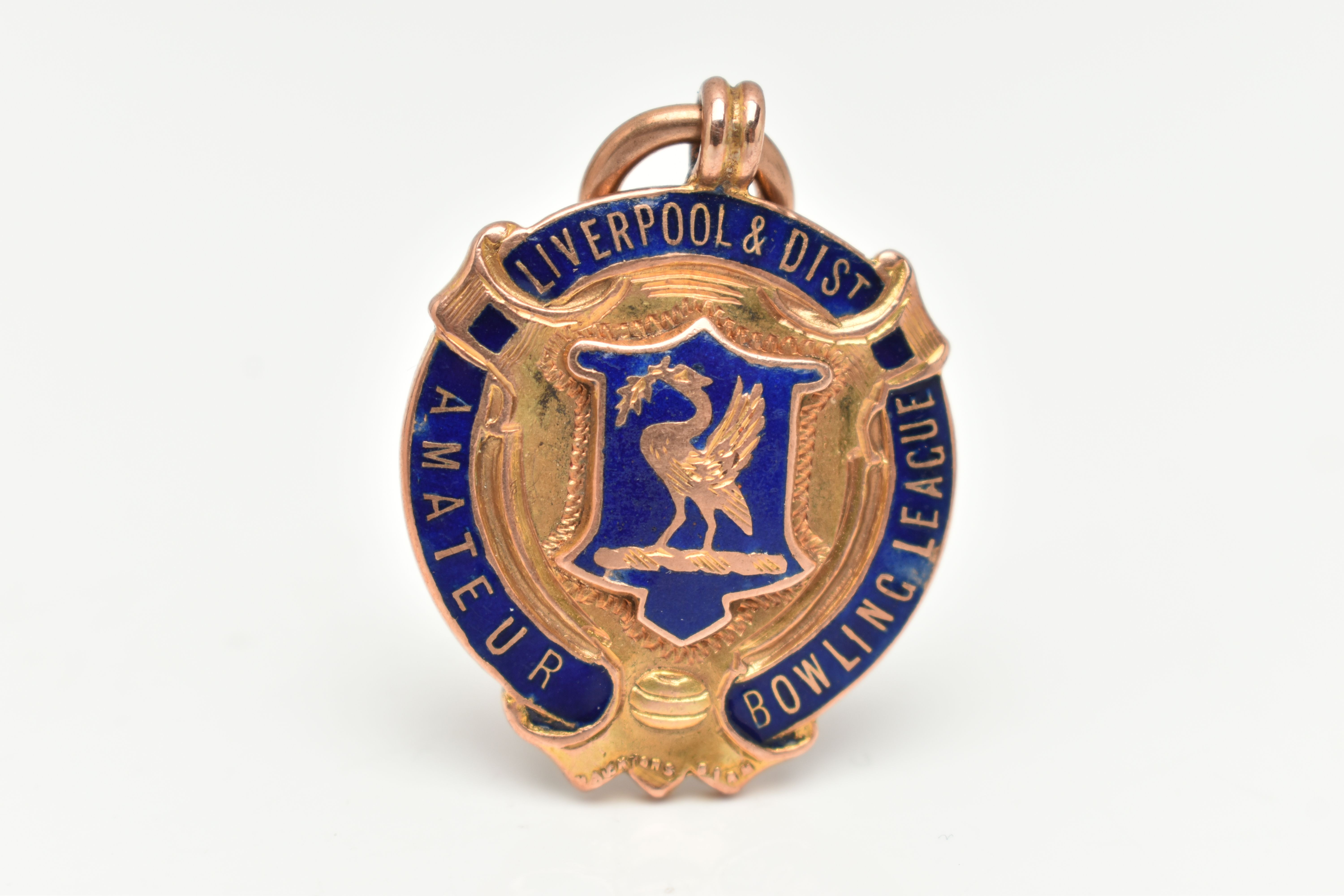 A 9CT GOLD ENAMEL FOB MEDAL, circular form with blue enamel detail, inscribed 'Liverpool & Dist,