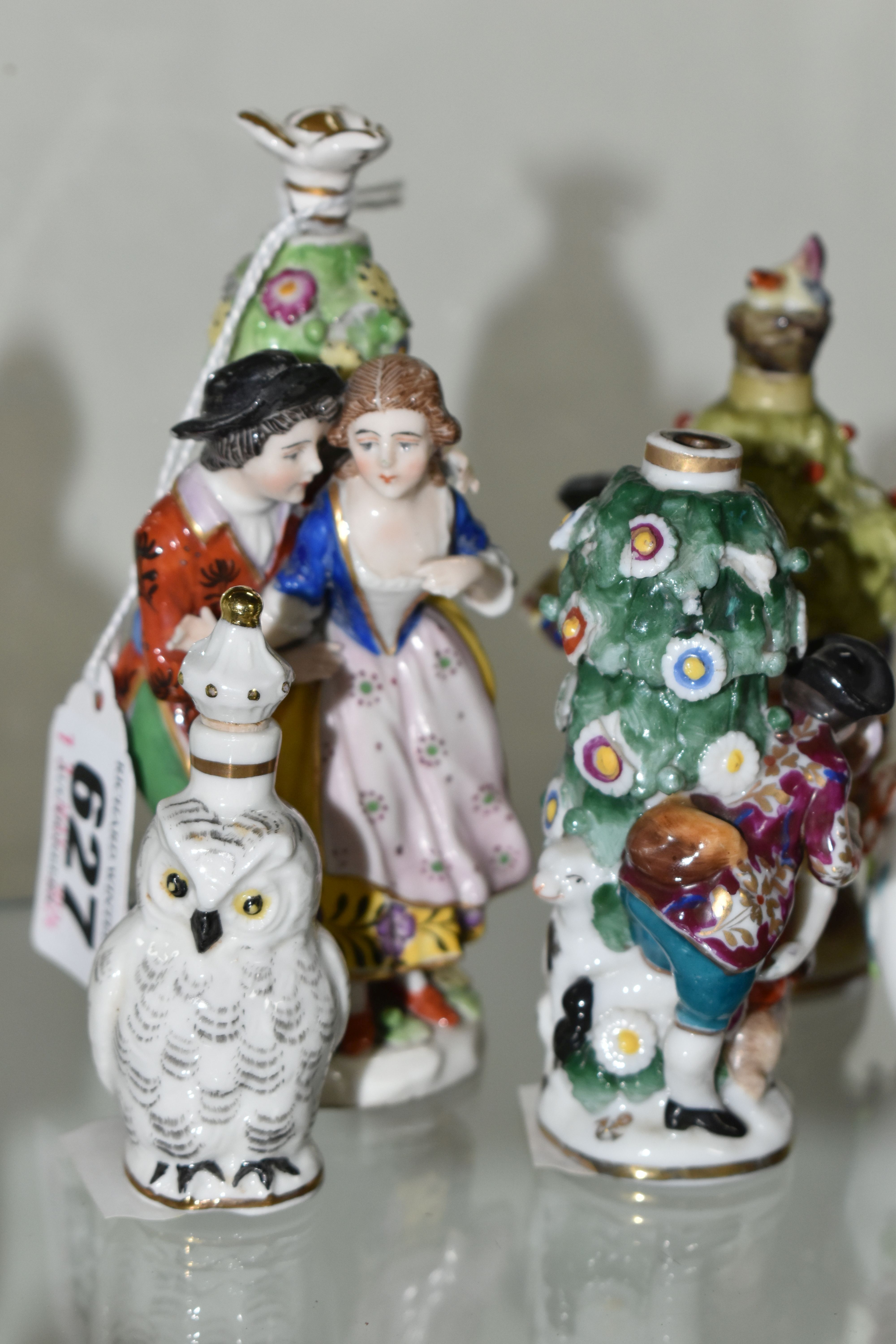 FIVE LATE 19TH AND 20TH CENTURY CONTINENTAL PORCELAIN SCENT BOTTLES, three of figural form with - Image 2 of 5