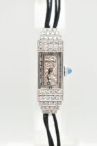 A LADIES DIAMOND SET COCKTAIL WATCH, manual wind watch, rectangular silver scrolling dial, signed '