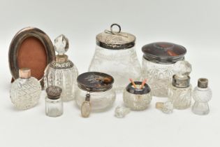 A BOX OF ASSORTED SILVER MOUNTED VANITY JARS AND SCENT BOTTLES, to include a small round glass jar