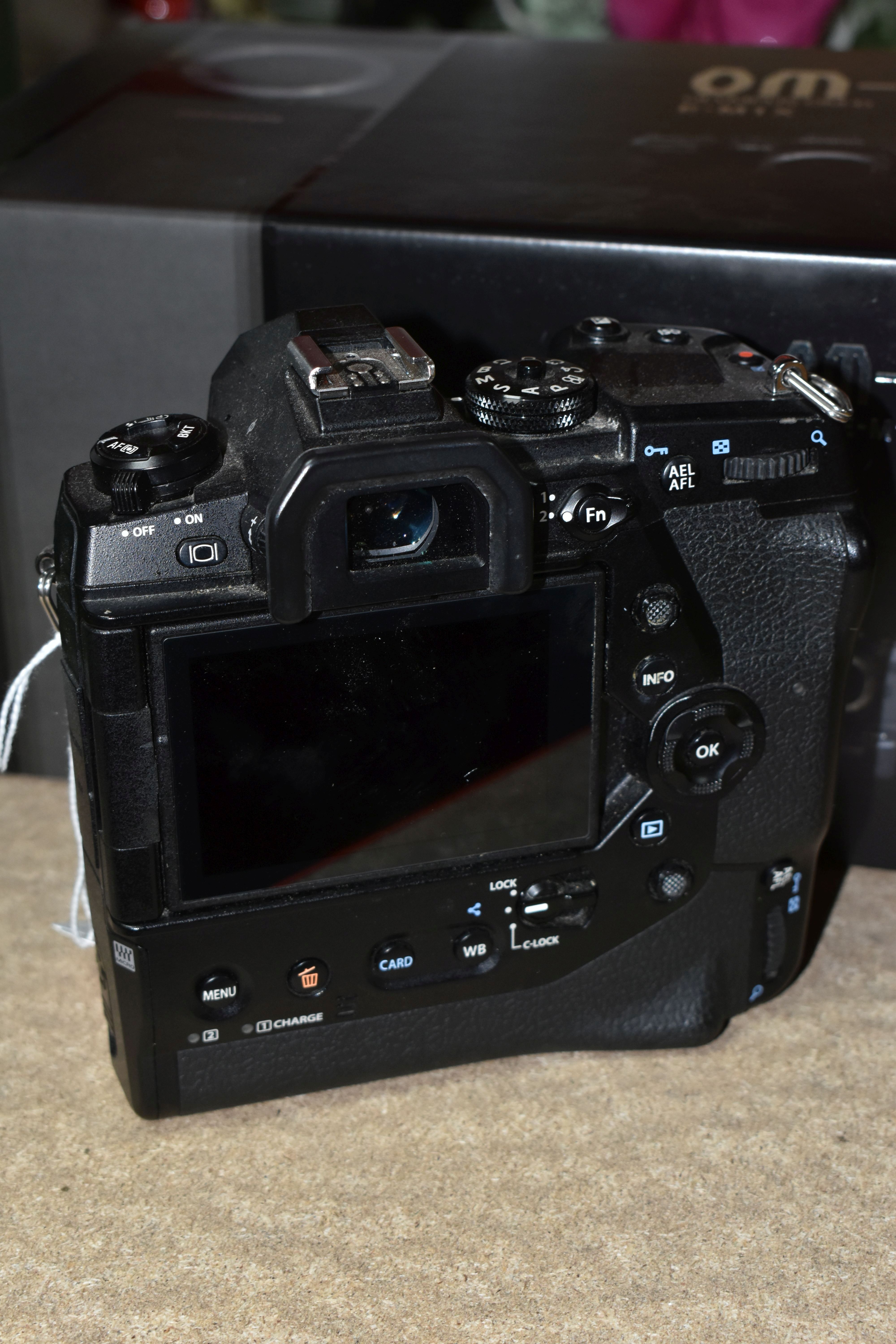 AN OLYMPUS OM-D E-M1X MIRRORLESS 4/3 CAMERA BODY, complete with battery charger (no UK power cable), - Image 2 of 4