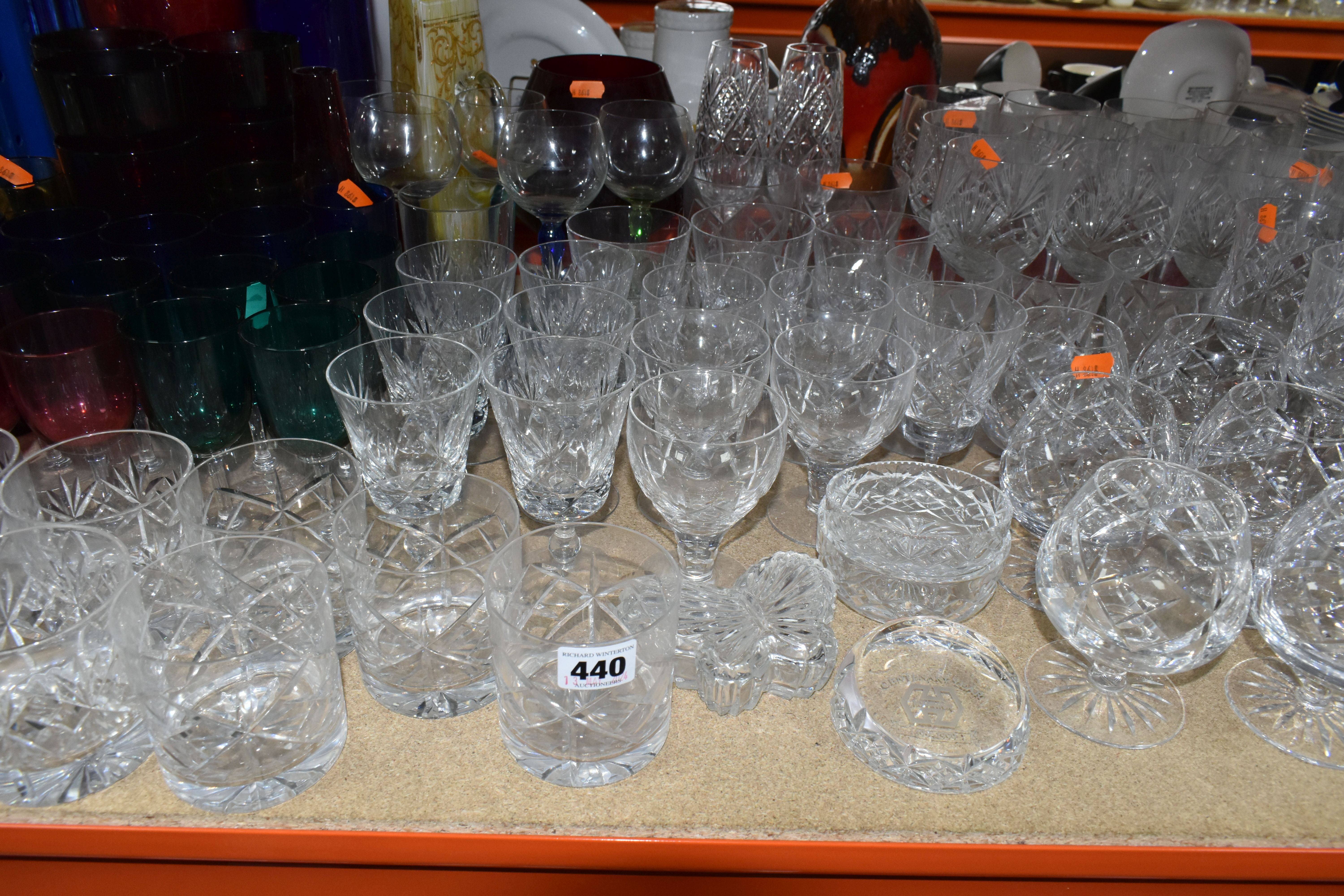 A LARGE SELECTION OF CRYSTAL CUT GLASS AND COLOURED GLASS VESSELS, including two sets of Tudor