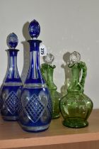 A GROUP OF BOHEMIAN GLASS DECANTERS, comprising a pair of 20th Century Bohemian blue flash glass