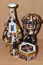 A GROUP OF ROYAL CROWN DERBY IMARI PATTERN PORCELAIN, comprising a 6299 pattern footed vase with