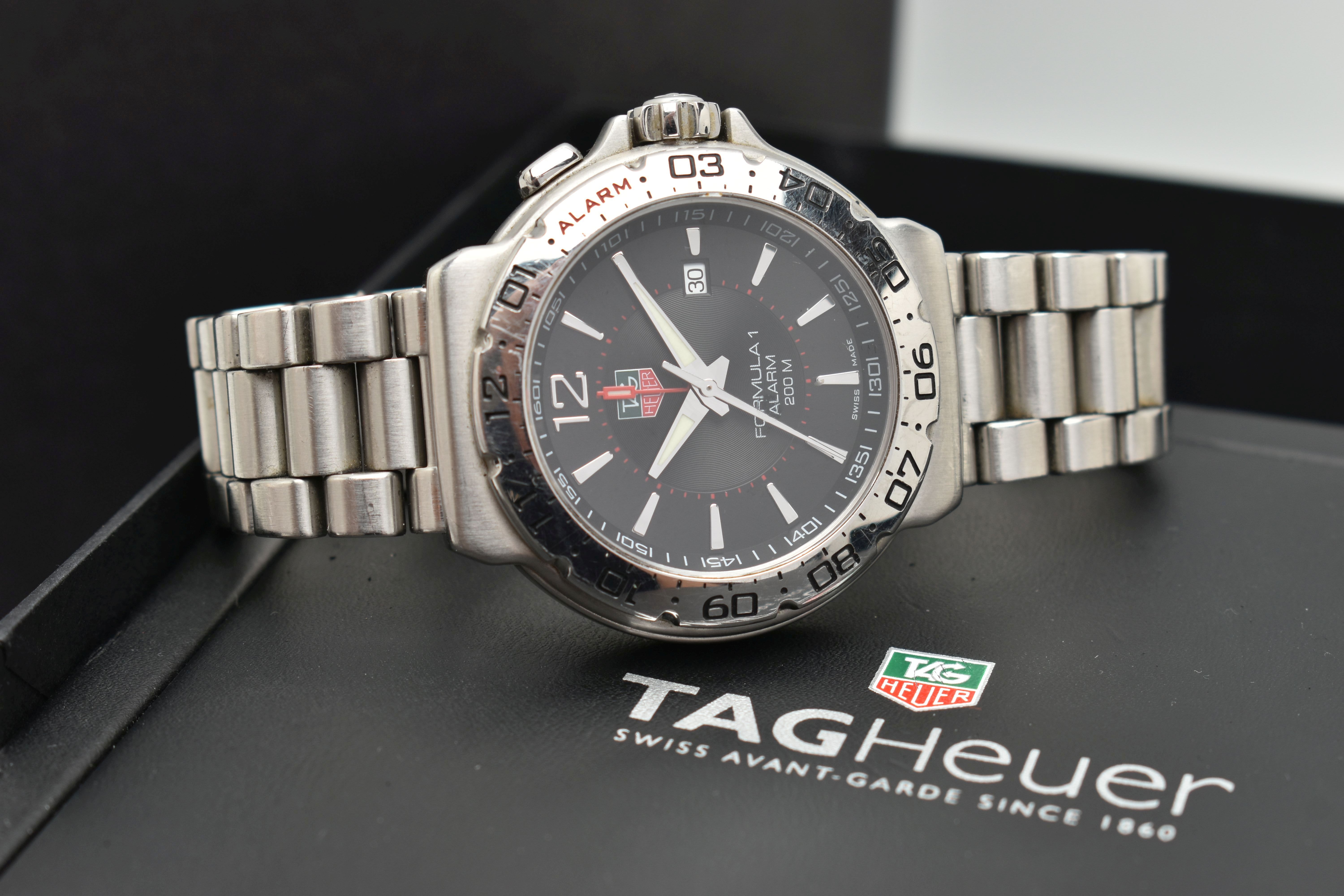 A 'TAG HEUER' FORMULA 1 WRISTWATCH, quartz movement, round black dial, signed 'Tag Heuer Formula 1 - Bild 9 aus 9