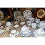 A QUANTITY OF CERAMIC ORNAMENTS including Royal Doulton Balloon Figure character plates, a Royal