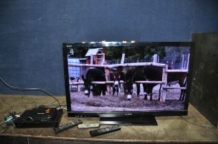 A SONY KDL 40HX803 40in TV WITH REMOTE, a Sony SVR-HDT500 HDD recorder with remote and an Asda DVD