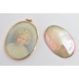 A YELLOW METAL PORTRAIT MINATURE PENDANT AND A MOTHER OF PEARL BROOCH, the oval pendant, depicting a